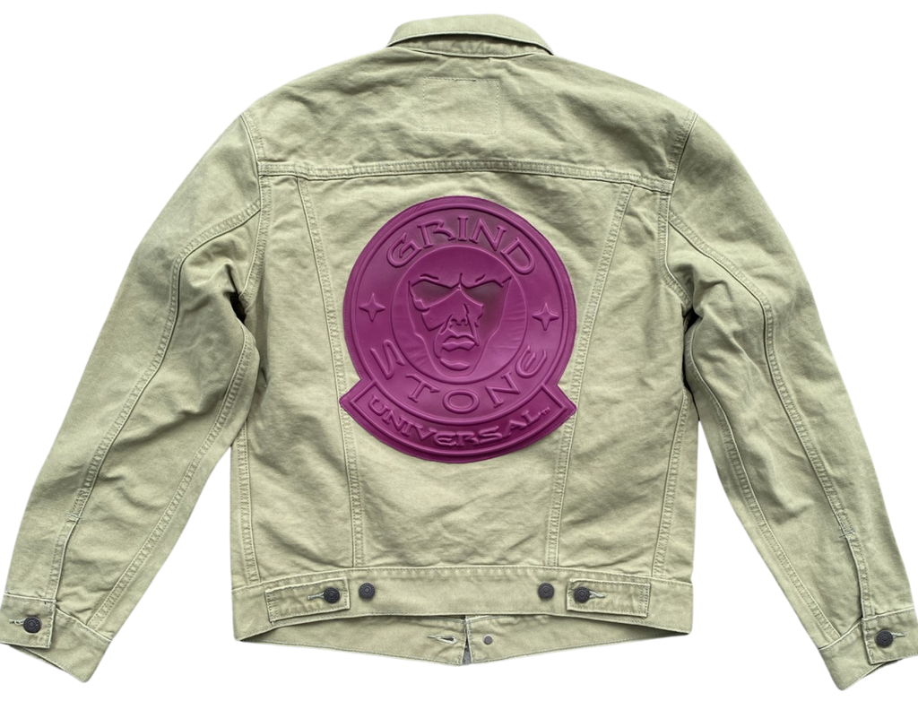 Light green jacket with a purple logo on the back against a white background